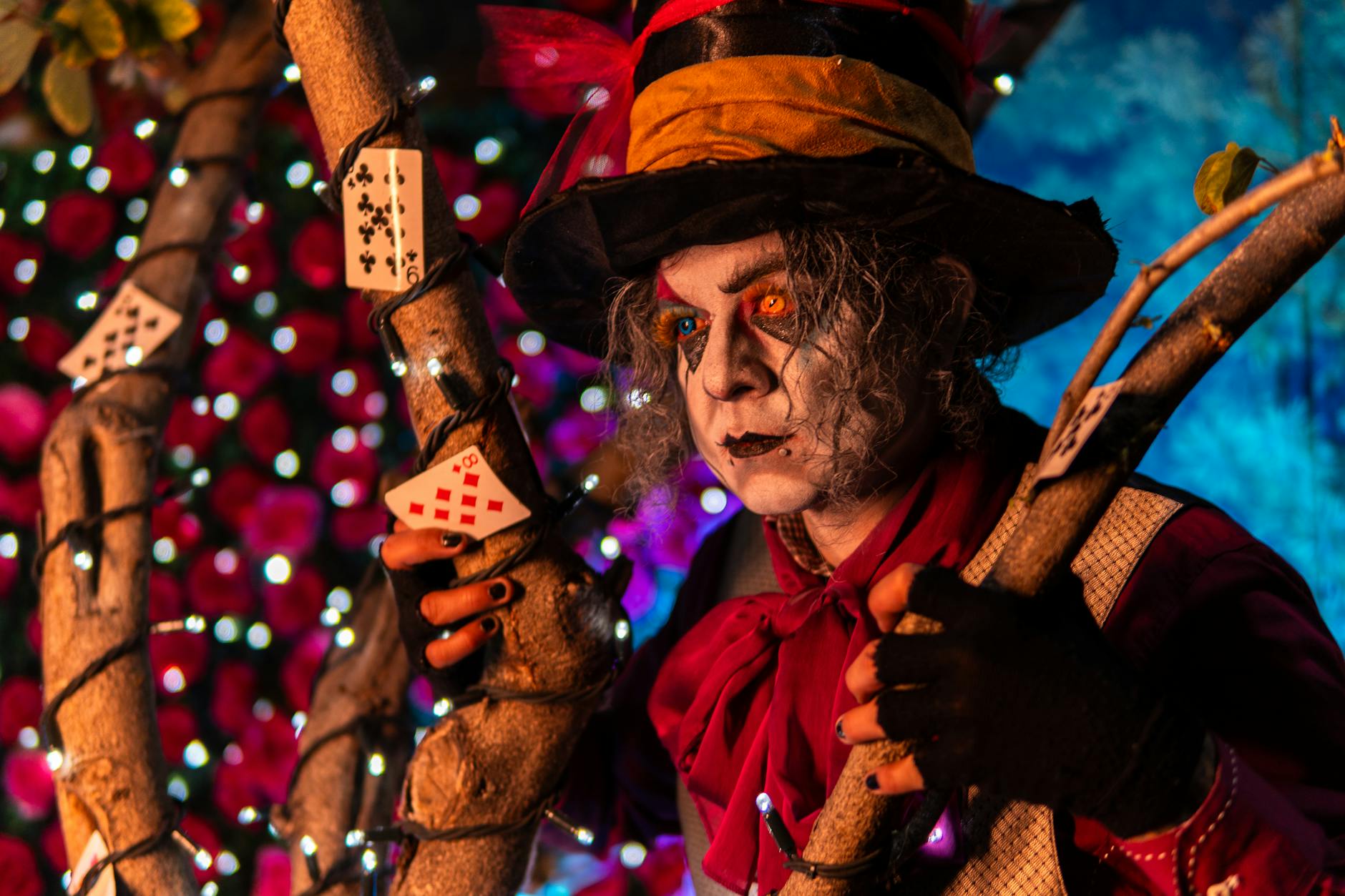 colorful mad hatter cosplay in wonderland setting